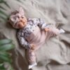 kleding voor baby's met een pavlik bandage