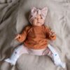 kleding voor baby's met een pavlik bandage